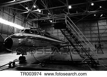 Stock Photo - jet repair in 
hangar. fotosearch 
- search stock 
photos, pictures, 
images, and photo 
clipart