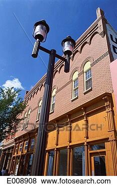 Stock Photo - streetlight with 
old-fashioned 
storefront in 
background. fotosearch 
- search stock 
photos, pictures, 
images, and photo 
clipart