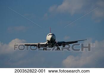 Stock Photography - jet airliner in 
flight. fotosearch 
- search stock 
photos, pictures, 
images, and photo 
clipart
