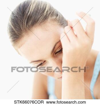 Stock Photo - close-up of a 
woman smelling 
perfume on her 
wrist. fotosearch 
- search stock 
photos, pictures, 
images, and photo 
clipart