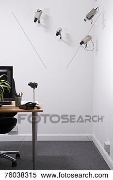 Stock Image - surveillance cameras 
pointed at desk 
in office. fotosearch 
- search stock 
photos, pictures, 
images, and photo 
clipart