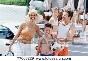 Stock Photograph - parents with daughter 
(8-9 years) and 
son (12-13 years) 
walking with. 
fotosearch - search 
stock photos, 
pictures, images, 
and photo clipart