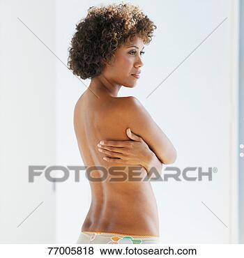 Stock Photo - semi dressed woman, 
side view, waist 
up. fotosearch 
- search stock 
photos, pictures, 
images, and photo 
clipart