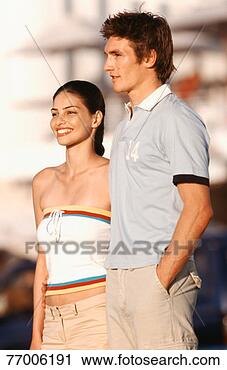 Stock Photography - young couple outdoors, 
upper half. fotosearch 
- search stock 
photos, pictures, 
images, and photo 
clipart