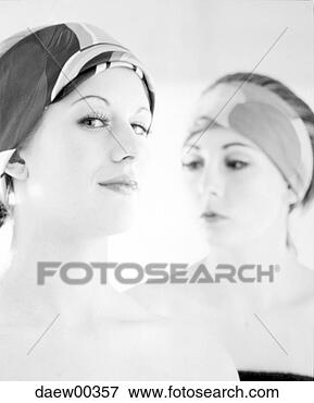 Picture - ewing, woman, 
torso, upper part 
of the body, blanket, 
cloth, close-up. 
fotosearch - search 
stock photos, 
pictures, images, 
and photo clipart