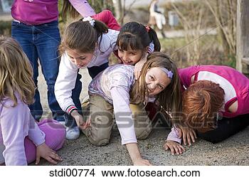 Stock Photo - child, playing 
children, children, 
young, laugh, 
pools, trees. 
fotosearch - search 
stock photos, 
pictures, images, 
and photo clipart