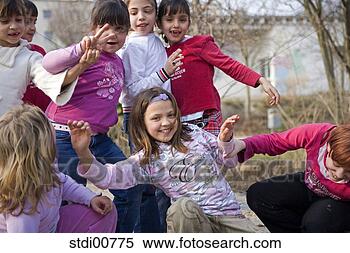 Stock Image - child, playing 
children, children, 
girl, laugh, pools, 
trees. fotosearch 
- search stock 
photos, pictures, 
images, and photo 
clipart