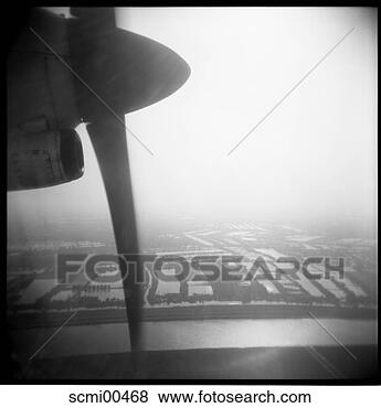 Stock Photo - high up, holidays, 
vacation, thailand, 
sky, fly, flying. 
fotosearch - search 
stock photos, 
pictures, images, 
and photo clipart