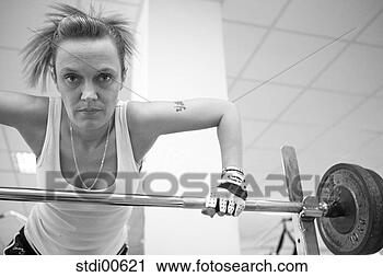 Stock Photography - strength training, 
 woman,  dumbbell, 
 bodybuilding, 
 teddy. fotosearch 
- search stock 
photos, pictures, 
images, and photo 
clipart