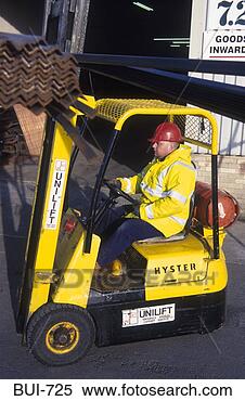 Stock Image - fork lift truck 
carrying angle 
iron uk. fotosearch 
- search stock 
photos, pictures, 
images, and photo 
clipart
