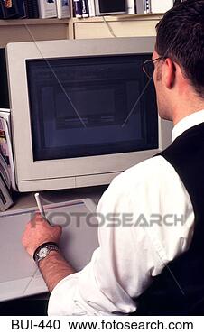 Stock Photography - man using graphics 
tablet with computer. 
fotosearch - search 
stock photos, 
pictures, images, 
and photo clipart