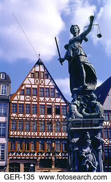 Stock Image - statue of justice 
near old houses 
frankfurt germany. 
fotosearch - search 
stock photos, 
pictures, images, 
and photo clipart