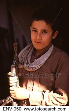 Stock Photography - young boy with 
russian machine-gun 
afghanistan. fotosearch 
- search stock 
photos, pictures, 
images, and photo 
clipart