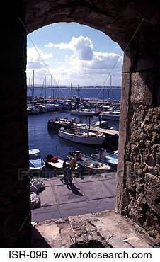 Stock Photo - boats in akko 
harbour framed 
by archway israel. 
fotosearch - search 
stock photos, 
pictures, images, 
and photo clipart