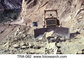 Stock Photo - bulldozer in action  pakistan. fotosearch  - search stock  photos, pictures,  wall murals, images,  and photo clipart
