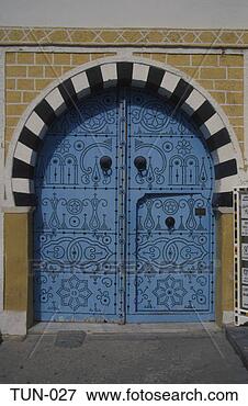 Picture - ornate arched 
door sousse tunisia. 
fotosearch - search 
stock photos, 
pictures, images, 
and photo clipart