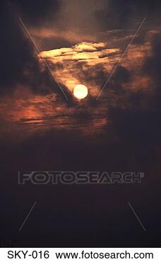 Stock Photo - sun obscured by 
wispy cloud. fotosearch 
- search stock 
photos, pictures, 
images, and photo 
clipart
