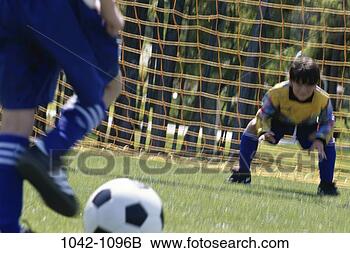 Stock Photo - block, playing, 
motion, guard, 
sports, competition. 
fotosearch - search 
stock photos, 
pictures, images, 
and photo clipart