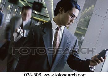 Stock Photo - dial, dialing, 
telephone, asian, 
phone, business. 
fotosearch - search 
stock photos, 
pictures, images, 
and photo clipart