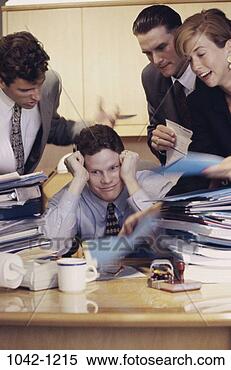Stock Image - group, desk, paperwork, 
overwhelmed, stress, 
business, chaotic. 
fotosearch - search 
stock photos, 
pictures, images, 
and photo clipart
