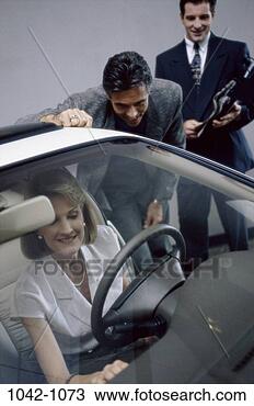 Stock Photo - groups, people, 
smiling, suit, 
car, pearl, dress. 
fotosearch - search 
stock photos, 
pictures, images, 
and photo clipart