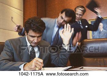 Stock Photo - meeting, men, 
desk, stress, 
signing, business, 
chaotic. fotosearch 
- search stock 
photos, pictures, 
images, and photo 
clipart
