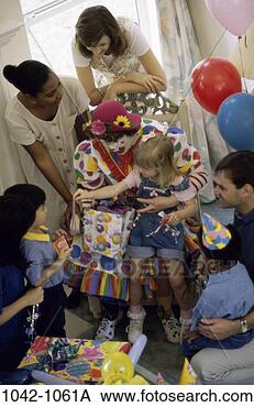 Stock Photo - multiethnic, people, 
party, balloons, 
birthday, clown, 
gifts. fotosearch 
- search stock 
photos, pictures, 
images, and photo 
clipart