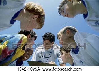 Stock Photo - multiethnic, people, 
sports, leadership, 
teamwork, children, 
boys. fotosearch 
- search stock 
photos, pictures, 
images, and photo 
clipart