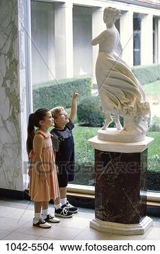 Stock Photo - people, art, sculpture, 
curious, statue, 
children, museum. 
fotosearch - search 
stock photos, 
pictures, images, 
and photo clipart