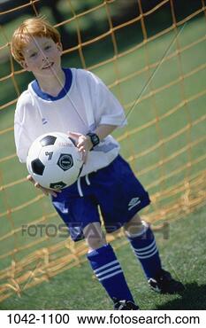 Stock Photography - people, running, 
smiling, ball, 
happy, playful, 
boy. fotosearch 
- search stock 
photos, pictures, 
images, and photo 
clipart