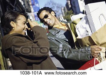 Stock Photo - people, smiling, 
couple, laughing, 
sunglasses, playful, 
outdoors. fotosearch 
- search stock 
photos, pictures, 
images, and photo 
clipart