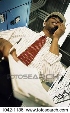 Stock Photo - tie, pen, industry, 
construction, 
smiling, telephone. 
fotosearch - search 
stock photos, 
pictures, images, 
and photo clipart