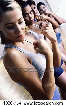 Stock Photo - women, people, 
sports, strength, 
conformity, indoors, 
muscles. fotosearch 
- search stock 
photos, pictures, 
images, and photo 
clipart