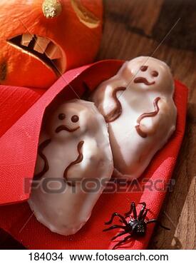 Stock Photo - chocolate ghost 
cakes (sponge 
cake with glacé 
icing). fotosearch 
- search stock 
photos, pictures, 
images, and photo 
clipart