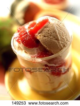 Stock Photo - coffee ice cream 
with segmented 
grapefruit in 
glass. fotosearch 
- search stock 
photos, pictures, 
images, and photo 
clipart
