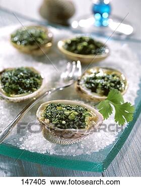 Stock Image - gratin of clams 
with herbs on 
salt on platter. 
fotosearch - search 
stock photos, 
pictures, images, 
and photo clipart