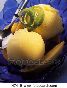 Stock Photo - mango sorbet in 
a blue glass dish. 
fotosearch - search 
stock photos, 
pictures, images, 
and photo clipart