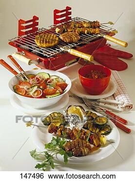 Stock Photo - peppered vienna 
steak, kebabs 
and grilled vegetables; 
salad. fotosearch 
- search stock 
photos, pictures, 
images, and photo 
clipart