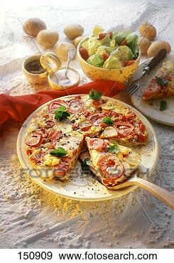 Stock Photograph - potato tortilla 
with tomatoes, 
pepper and parsley 
(2). fotosearch 
- search stock 
photos, pictures, 
images, and photo 
clipart