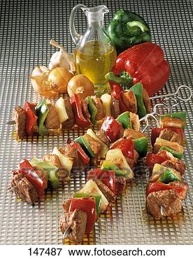 Picture - raznici (yugoslavian 
meat and vegetables 
kebabs). fotosearch 
- search stock 
photos, pictures, 
images, and photo 
clipart
