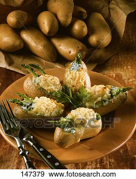 Stock Photograph - stuffed potato 
gratin with asparagus 
and cheese. fotosearch 
- search stock 
photos, pictures, 
images, and photo 
clipart