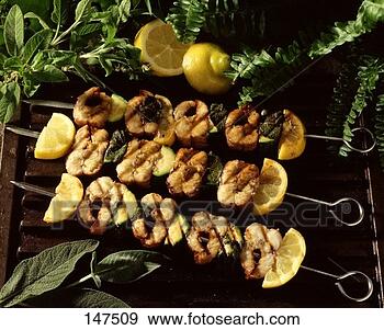Stock Photograph - three grilled 
eel and courgette 
kebabs. fotosearch 
- search stock 
photos, pictures, 
images, and photo 
clipart