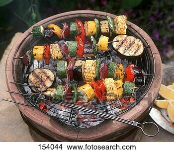 Stock Photo - vegetable kebabs 
on the barbecue. 
fotosearch - search 
stock photos, 
pictures, images, 
and photo clipart