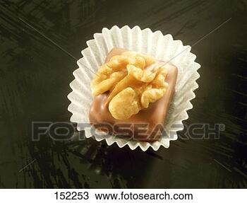 Stock Photo - a walnut and marzipan 
chocolate. fotosearch 
- search stock 
photos, pictures, 
images, and photo 
clipart