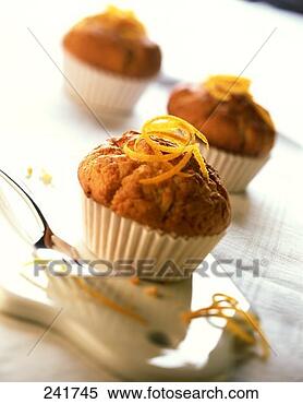 Stock Image - lemon muffins 
in paper cases. 
fotosearch - search 
stock photos, 
pictures, images, 
and photo clipart