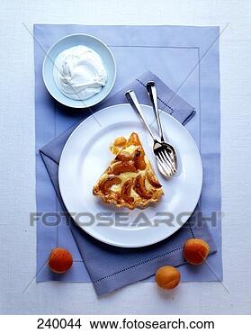 Stock Photo - piece of caramelised 
apricot tart; 
cream. fotosearch 
- search stock 
photos, pictures, 
images, and photo 
clipart