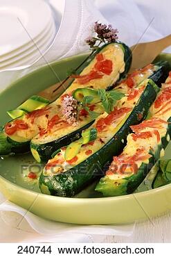Stock Photo - stuffed courgettes 
with tomatoes, 
ham and soft cheese. 
fotosearch - search 
stock photos, 
pictures, images, 
and photo clipart
