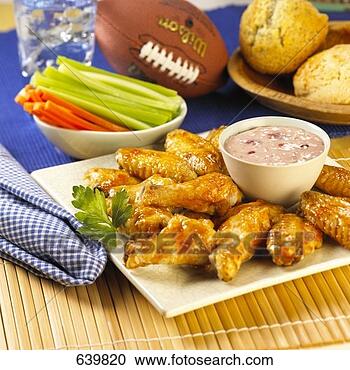 Stock Photography of Buffalo Wings with Strawberry Dipping Sauce...