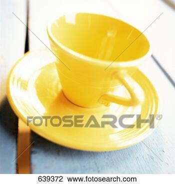 Stock Photo - yellow coffee 
cup and saucer. 
fotosearch - search 
stock photos, 
pictures, images, 
and photo clipart