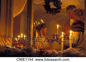 Stock Photo - december 13th 
in sweden is saint 
lucia day when 
daughters wearing. 
fotosearch - search 
stock photos, 
pictures, images, 
and photo clipart